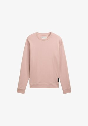 Világos rózsaszín pulóver hosszú ujjal, kerek nyakkivágással és bordás mandzsettával. Texturált anyagból készült, és oldalt címkével rendelkezik.