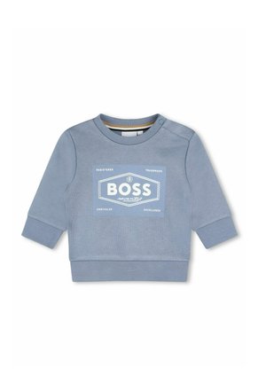 Sweatshirt bleu clair en mélange de coton, avec un col rond, des manches longues et un design de logo graphique blanc à l'avant.