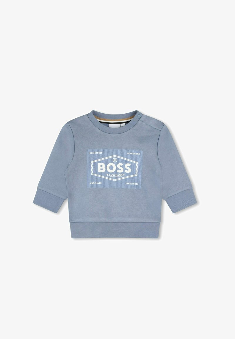 Felpa azzurra chiara realizzata in misto cotone, con collo tondo, maniche lunghe e una grafica del logo bianco sul davanti.