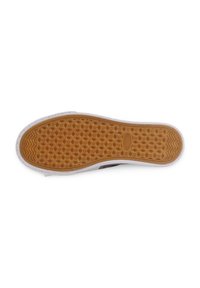 Semelle de chaussure en caoutchouc avec un motif en zigzag tan et une texture en nid d'abeille. Bord blanc autour de l'extrémité. Design durable pour l'adhérence et le soutien.