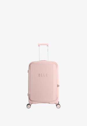 Hard-shell pink suitcase with vertical ribbing, silver accents, telescopic handle, and four multi-directional wheels. Features brand lettering.