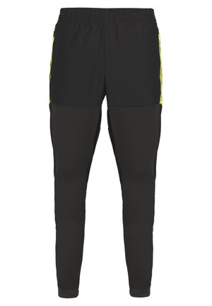 Puma FTBLNXT PRO  - Jogginghose - black/ultra yellow