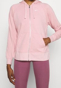 Nike Performance Felpa con zip - pink