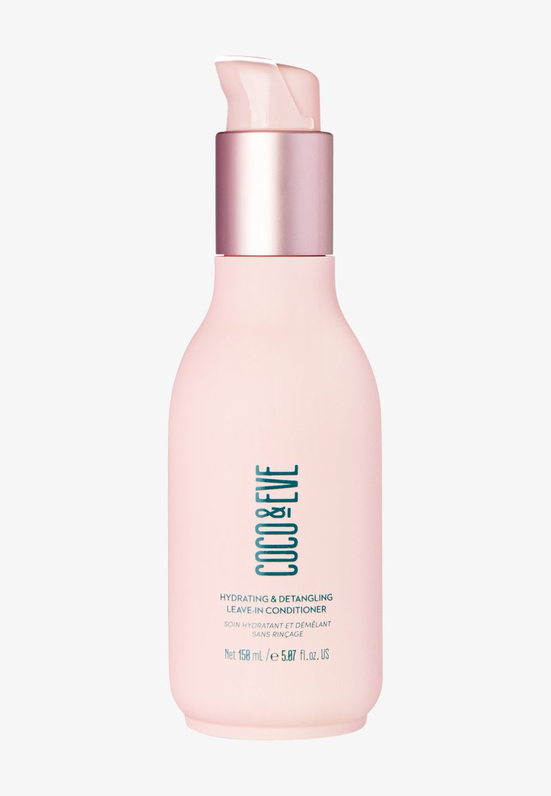 Rosa pumpflaska av Coco & Eve återfuktande och utredande leave-in balsam, 158 ml, med pumpdispenser i roséguld.