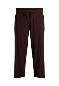 Bruna, ribbade, lätta loungbyxor med dragsko i midjan och kort längd. Har raka ben och ingen synlig hårdvara eller mönster.