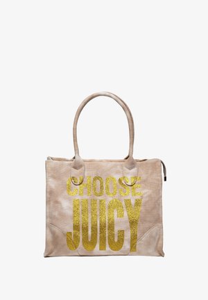 Beige canvas toteväska med dubbla handtag och "VÄLJ SAFTIG" i stora guldglittrande bokstäver. Enkel design med mjuk textur och minimala detaljer.