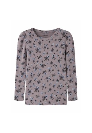 Chemise mauve à manches longues avec petit imprimé floral gris et bleu et épaules légèrement bouffantes, conçue pour enfants.