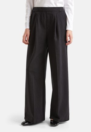 HIGH-WAISTED  - Trousers - black