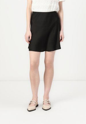 Black, satin mini skirt with a smooth texture, featuring a slightly flared hem and side slits for ease of movement.