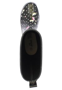 Botte de pluie noire imperméable avec des pois blancs et des motifs floraux. Extérieur lisse, bout arrondi et fermeture éclair à l'arrière.