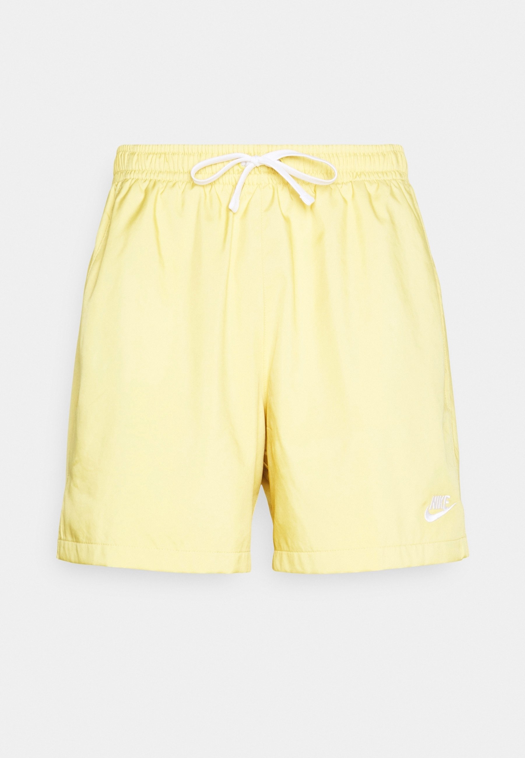 gold nike woven shorts
