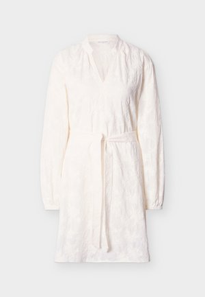 White dress made of textured fabric with floral embroidery, featuring a V-neck, long sleeves, and a belted waist for adjustable fit.