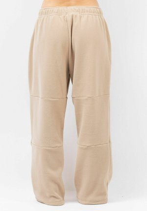 Beige fleece broek met een elastische tailleband, met een ontspannen pasvorm en dubbele gestikte naden, een gladde textuur en geen zichtbare hardware.