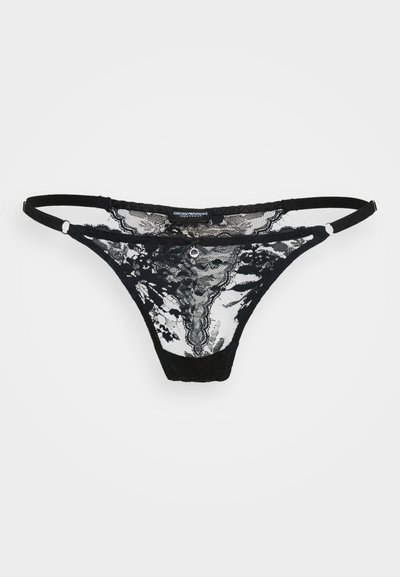 Schwarze Spitzenpanty mit durchscheinendem Blumenmuster, verstellbaren Trägern und einem dekorativen Akzent an der Vorderseite. Weicher Stoff.