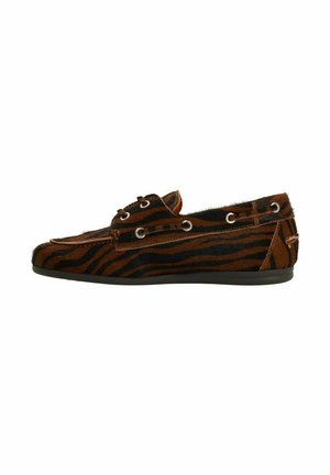 Brown and black striped loafers with a fur-like texture, eyelets for laces, and a flat, black rubber sole. Classic casual design.