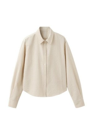 Chemise beige à manches longues avec des boutons, présentant un petit motif à carreaux et un col classique.