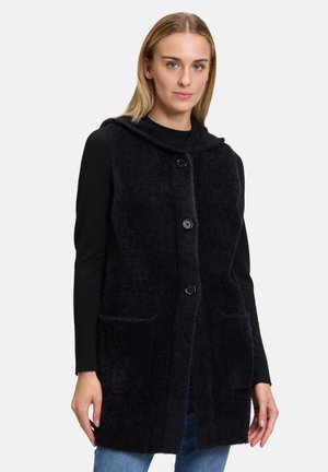 MIT KAPUZE - Waistcoat - schwarz