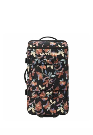 Maleta negra con ruedas con estampado floral en rojo, beige y azul y nombre de la marca Dakine en el bolsillo delantero, con múltiples asas y correas.