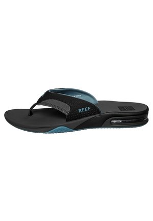 Czarno-niebieska klapka marki Reef z miękką podeszwą i widocznym amortyzatorem powietrznym w pięcie, widok z boku.