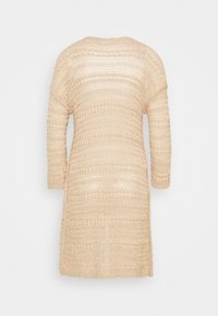 Knee-length, beige crochet knit dress with long sleeves, featuring a textured, horizontal striped pattern and a loose fit.