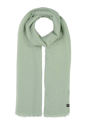 Hellgrüner, gerippter Schal mit dezenten Fransen an den Enden und einem kleinen schwarzen Stoffetikett an einem Ende, auf weißem Hintergrund in Schlaufe gelegt.