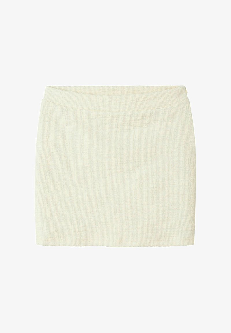 White textured mini skirt with a smooth waistband. The fabric features a subtle ribbed pattern, providing a soft and gentle surface.