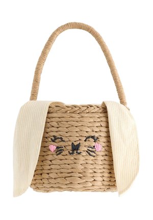 Geflochtene Strohtasche mit einem niedlichen Kaninchengesicht, das vorne aufgestickt ist, und langen gestreiften Stoff-Hasenohren, die an den oberen Kanten befestigt sind.