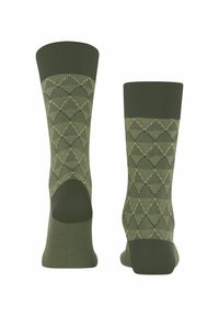Grüne, gemusterte Socken mit einem geometrischen Design und strukturierten Akzenten. Rippen an der Oberseite und gepolsterte Bereiche an Ferse und Spitze.