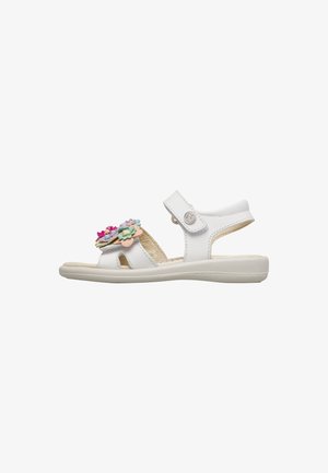 Sandalo bianco per bambini con cinturino regolabile alla caviglia e decorazioni floreali multicolori sulla cinghia frontale, suola imbottita, vista laterale.