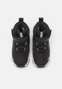 Black high-top sneakers with a textile upper, padded collar, elastic laces, and a white sole. Features a Puma logo on the tongue and side.