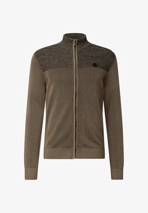 Ruskea vetoketjullinen takki, jossa on ribbikuvio ja tummanruskea yläosa. Korkea kaulus ja logo vasemmassa rintapielessä.