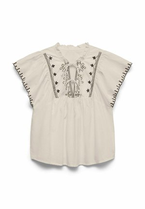 Blouse blanche avec manches courtes volantes, broderie florale noire et détails à nouer devant.