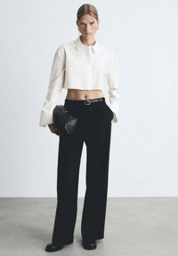 Mango Bluza s gumbima - off-white
