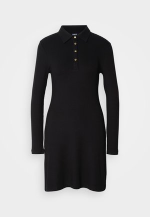 Black dress with long sleeves, ribbed texture, collared neckline, and three gold buttons at the front. Mid-thigh length. Classic design.