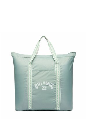 Grand sac cabas vert clair avec deux poignées à motifs et logo Billabong blanc centré sur le devant.