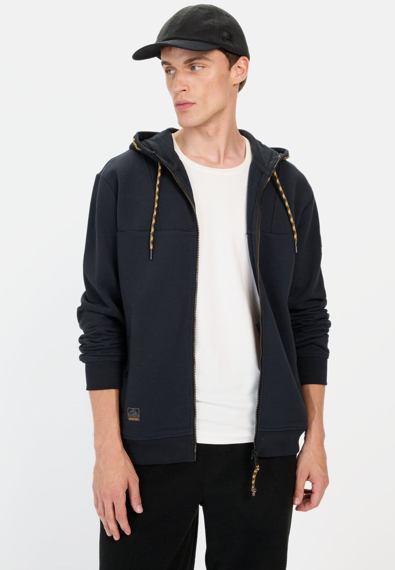 Marineblaue Zip-Hoodie mit einer Kapuze mit Kordelzug, aus strukturiertem Gewebe, mit kontrastierendem gelbem Kordelzug und Logopatch am Saum.