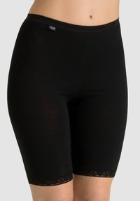 Black spandex shorts with a mid-thigh length, featuring a delicate lace trim at the hem and a seamless waistband.
