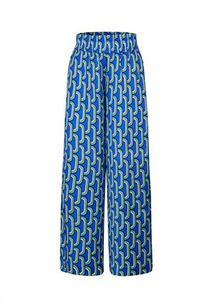 Pantaloni ampi blu con un motivo geometrico in verde e azzurro. Realizzati in materiale leggero con una vita elastica.