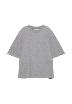 T-shirt gris uni surdimensionné à manches courtes avec un col rond, posé à plat sur un fond blanc.