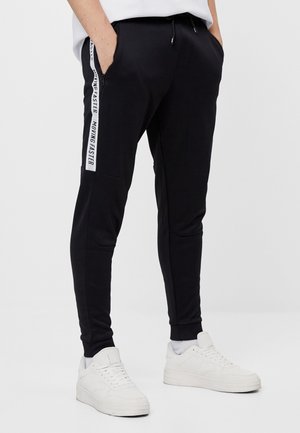 Pantalon de survêtement - black