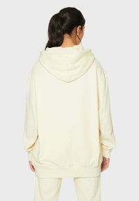 SQUATPROOF SP LEFT COMFY ACTIVE PUMP COVER  - Majica s kapuljačom - cream
