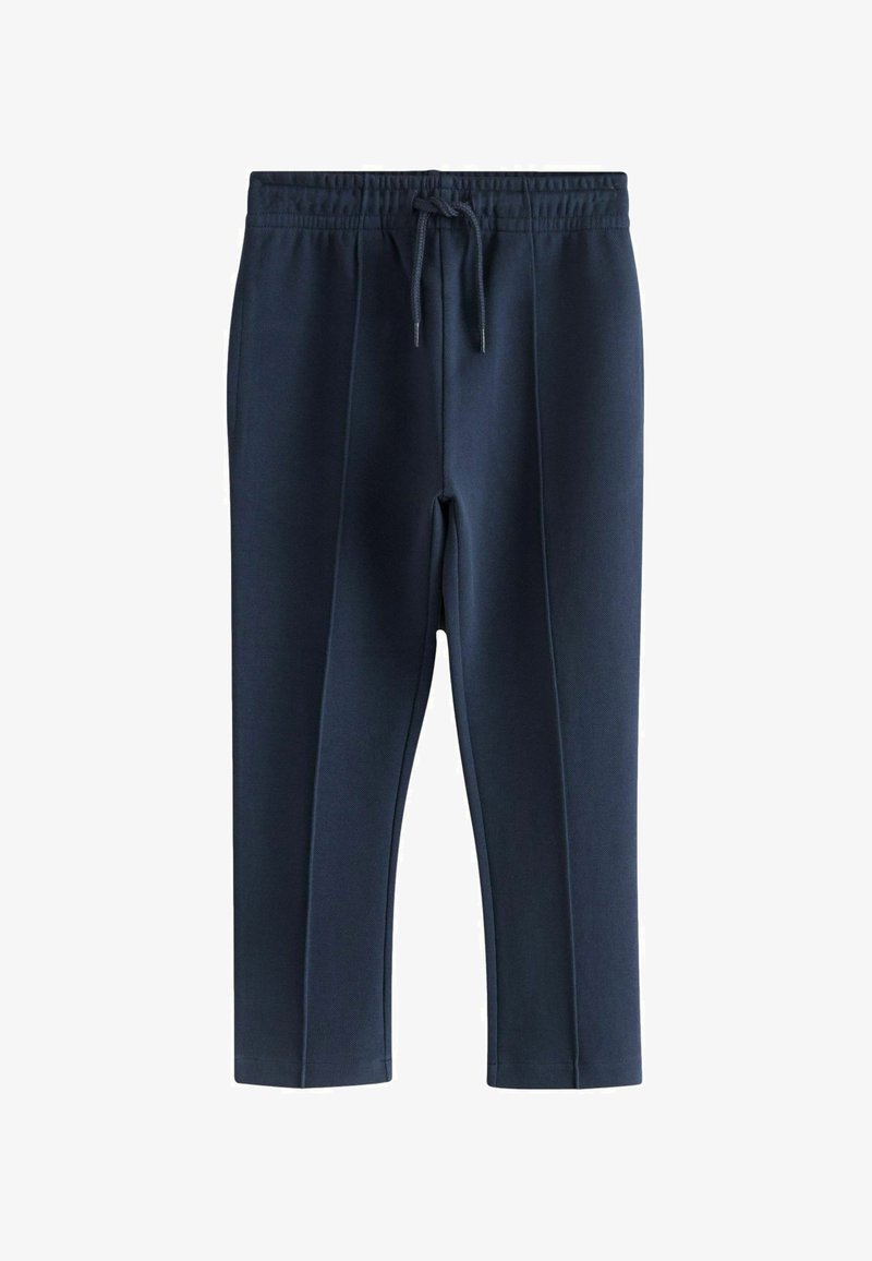 Pantalons de jogging bleu marine en tissu doux, dotés d'une taille élastique avec cordon de serrage, et de jambes fuselées avec des détails de couture latérale.