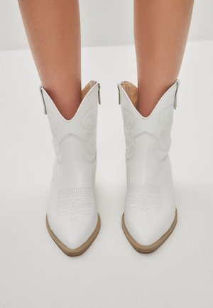 Bottines de cowboy / motard - white