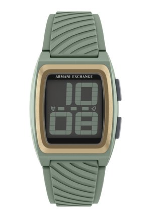 Orologio digitale Armani Exchange con cinturino in silicone verde, lunetta quadrata color oro e display LCD nero segmentato che mostra l'ora 10:08.