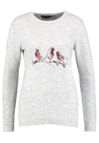 Ljusgrå tröja med långa ärmar, rund halsringning, vita prickar och tre broderade fåglar på en gren framtill.