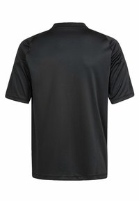 Svart sportskjorta med kort ärm, med en klassisk krage och mjuk, slät tyg. Inga synliga logotyper eller mönster.