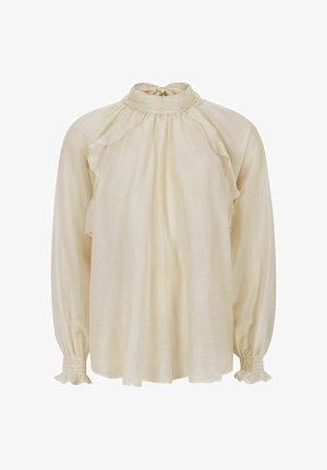 Bluzica kremne barve iz lahkega blaga, z visokim ovratnikom z volančki, spuščenimi rameni in nabranimi manšetami z dodatki volančkov.