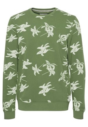 Sudadera verde con un patrón de hojas blancas, cuello redondo, mangas largas y puños y dobladillo acanalados. Material suave con un ajuste relajado.