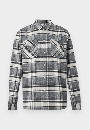 Camicia a maniche lunghe con bottoni, motivo a quadri nero, bianco e grigio, con due tasche sul petto e collo standard.