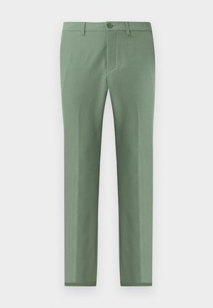 Pantalons slim en tissu doux et texturé de couleur vert clair. Dotés d'une fermeture à bouton unique et de poches latérales obliques. Fini lisse partout.